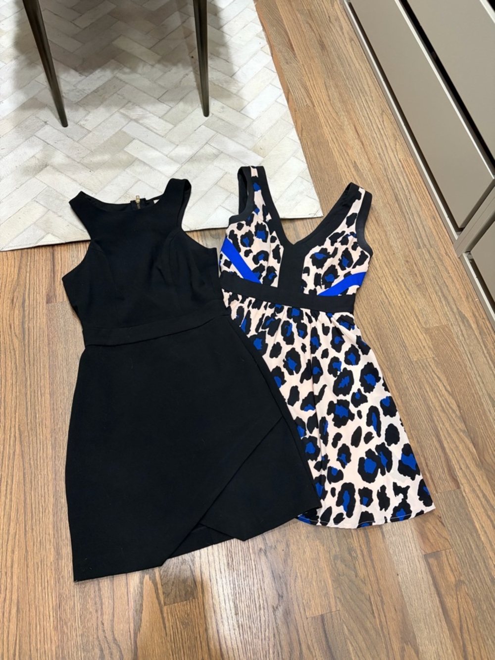 Black Sleeveless Mini Dress & Blue Leopard Print V-Neck Mini Dress